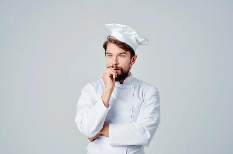 Мужчина в рабочей униформе, профессия повара, кухня, изолированный фон