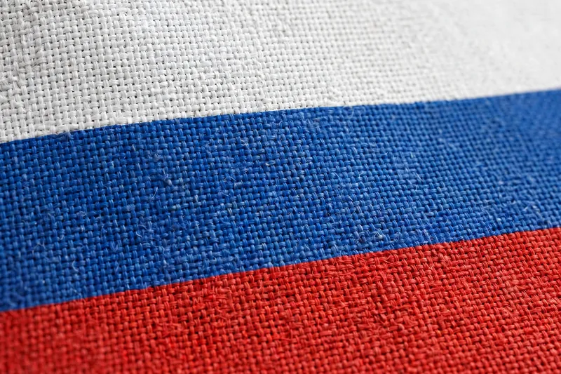 Ткань российского флага крупным планом с фактурой плетения