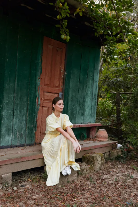 woman on porch rural vintage dress authenticity