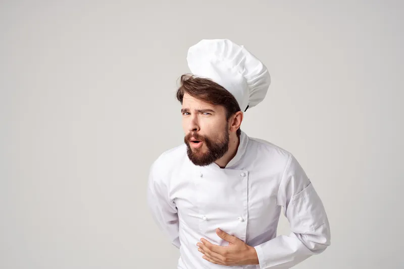 Мужчина в ресторане, профессиональный жест рукой, изолированный фон