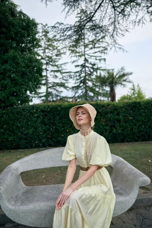 Woman bonnet dress authentic inclusive portrait