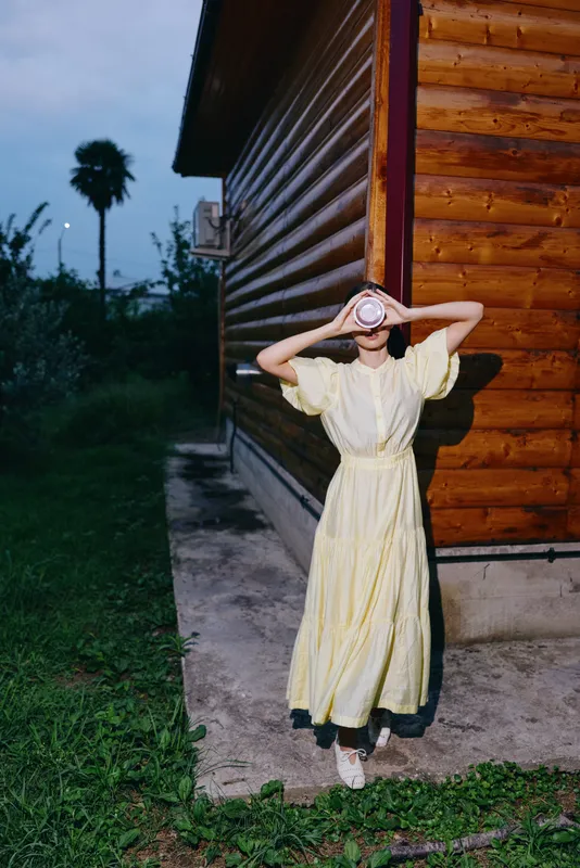 Inclusive authenticity, woman by cabin