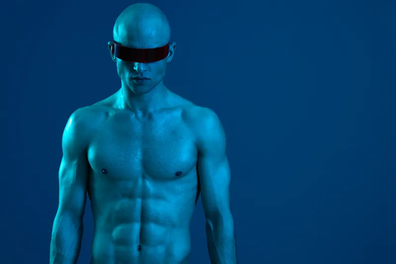 Muscular man in futuristic sunglasses, showcasing a striking blue light effect. The image captures a unique blend of modernity and strength, creating visual intrigue.