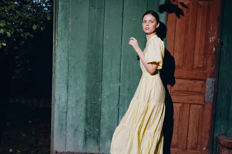 Woman dress doorway sunlight authentic inclusive