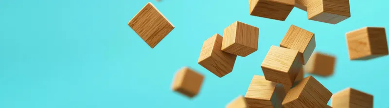 Парящие деревянные кубики на ярком бирюзовом фоне создают современный и свежий вид, идеально подходящий для концепций креативности, инноваций и технологий в дизайне