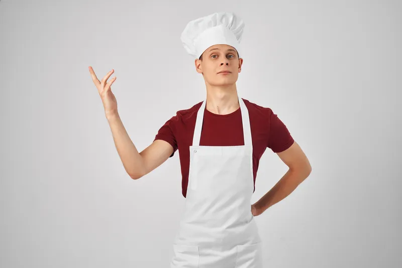 Мужчина в белом фартуке на кухне, профессия, ресторан, гурман