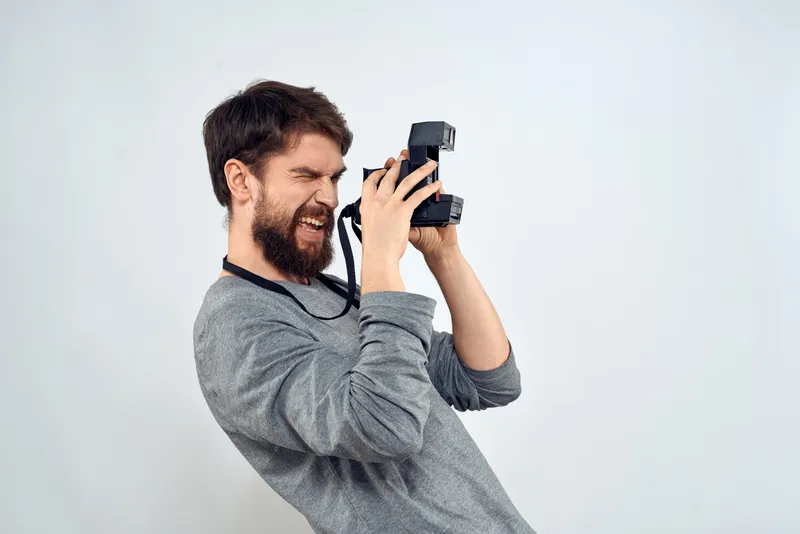 Фотограф с камерой