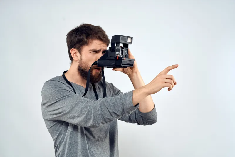 Фотограф с камерой