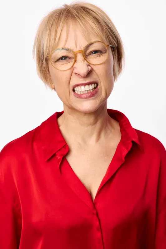 Woman portrait smile glasses senior red shirt closeup face cheerful, smiling senior lady with eyeglasses in studio headshot, isolated on white plain