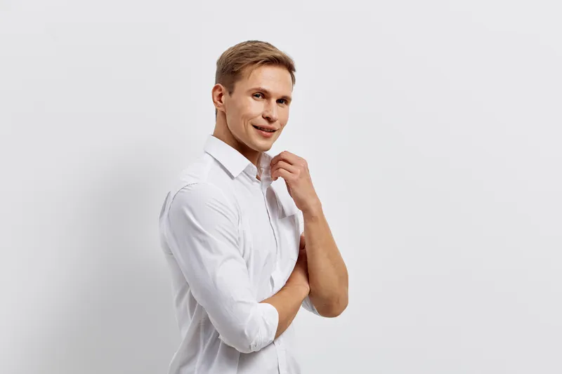young smiling caucasian man wearing white shirt standing isolated on white background digital nomad remote work concept