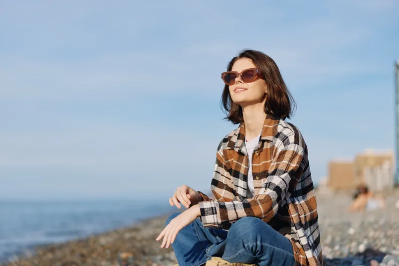 woman, sunglasses, beach, casual, outdoors, portrait, relaxed, fashion, sea, coastline, sunshine, calm mood, coastal breeze, open horizon, freedom, natural light