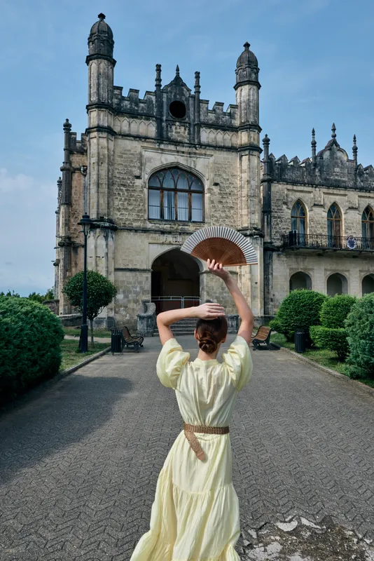 woman yellow dress historic mansion inclusive
