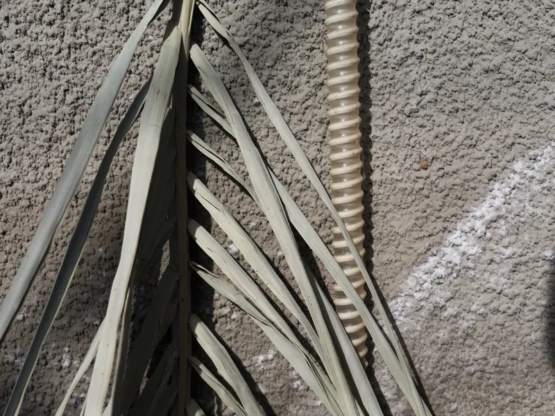 Closeup concrete texture with construction rebar rods and wire bundles, renovation and home improvement concept, tactile lifestyle background for repair and building
