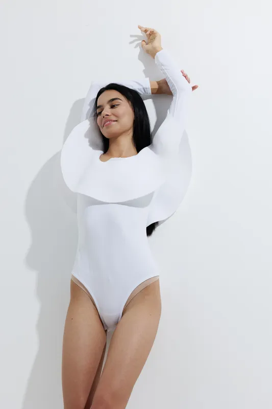 woman sport fitness wearing modern white bodysuit, stretching with closed eyes, minimalistic background, healthy lifestyle and relaxation concept, smooth skin, natural light