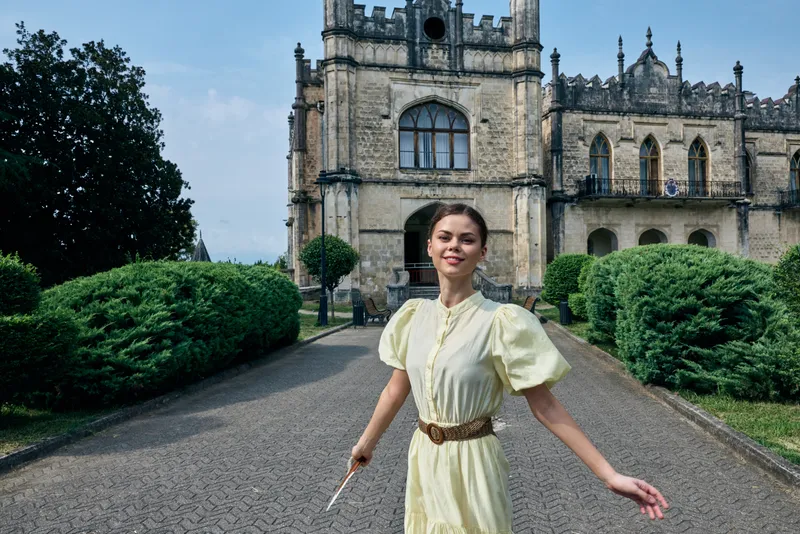 woman mansion smile dress dance historic garden authenticity inclusivity portrait