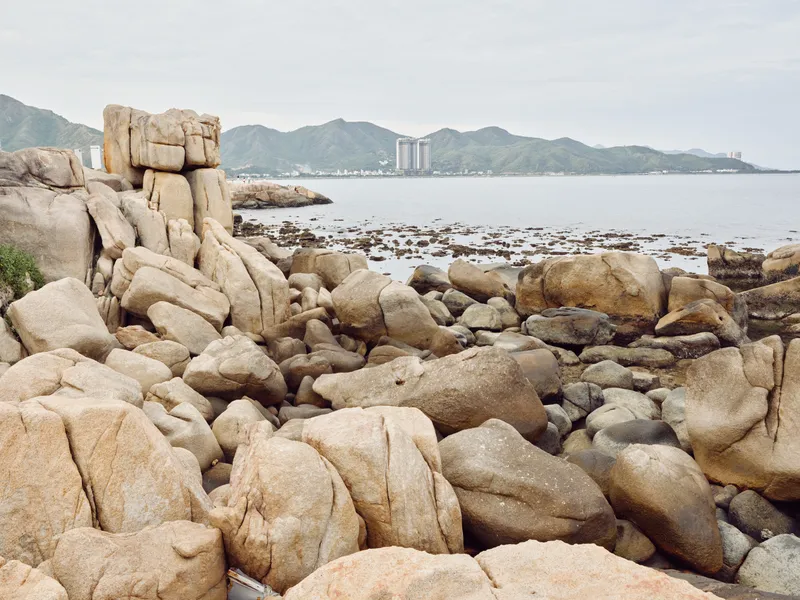 Serene coastal landscape showcasing rocky formations by the sea, perfect for nature and travel themes, evoking tranquility and exploration in a coastal setting