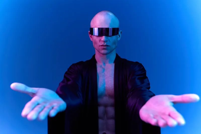 Futuristic man in high-tech glasses, showcasing a vibe of innovation and modernity. This striking image emphasizes a bold and expressive visual style.