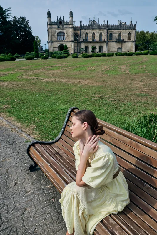 Woman bench mansion park sitting portrait dress authenticity inclusivity