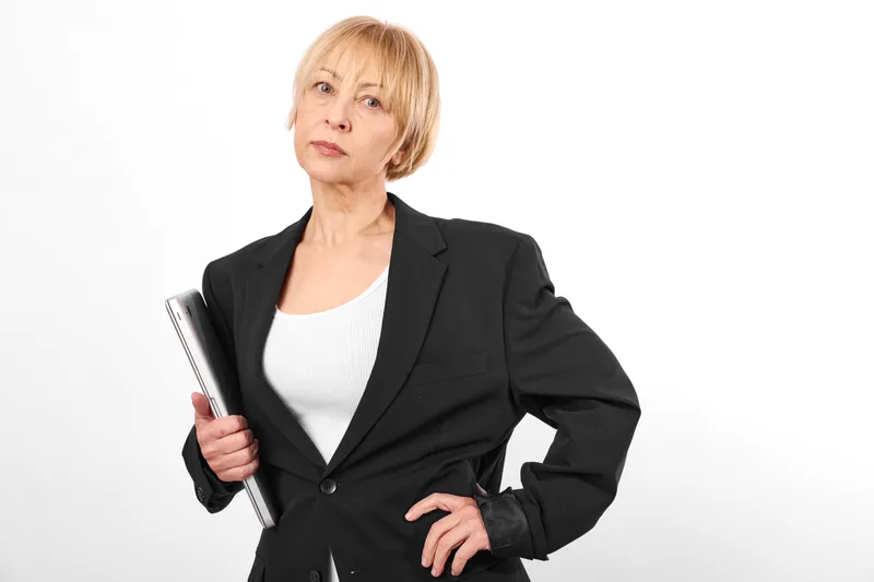 Woman business smartphone portrait serious concerned communication blazer office professional holding smartphone, standing against white background, expression