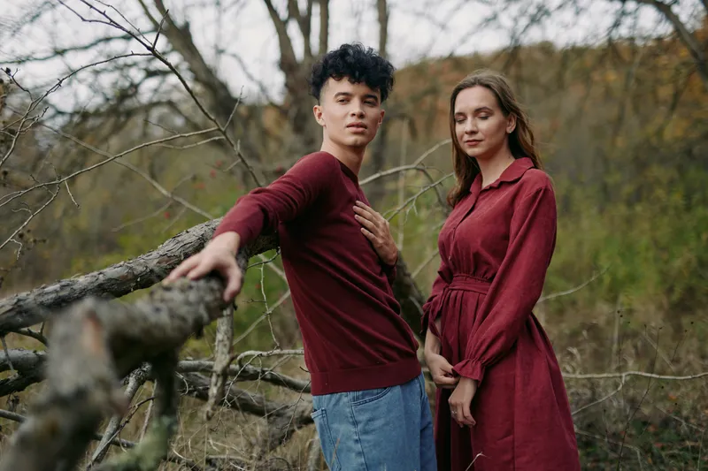 Genuine moment captured between two individuals in a natural setting, highlighting authenticity and real connection, with candid posture and soft, natural light.