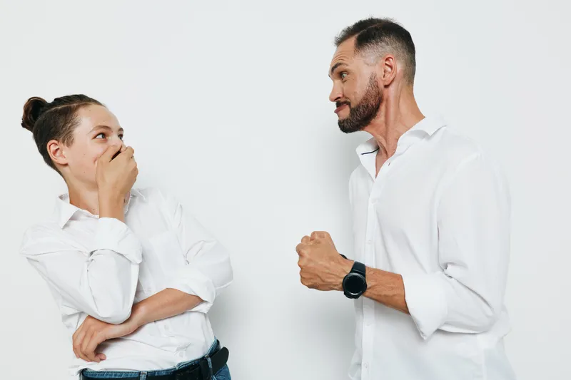 Professional man and colleague on an isolated color background, business tone, calm posture, confident expression, and clean attire showcase focus and leadership.