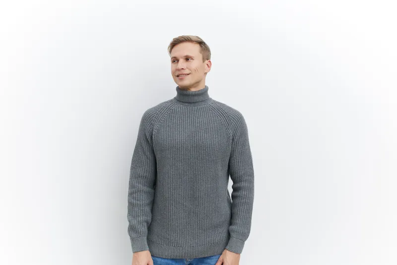 smiling man in gray knitted turtleneck sweater standing look aside isolated white background casual autumn winter clothing, mental health concept