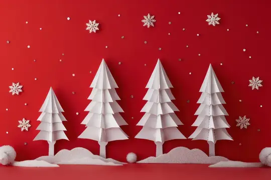 Бумажные ёлочки и снежинки на красном фоне