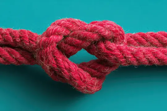 Крупный план красной верёвки с завязанным узлом на бирюзовом фоне