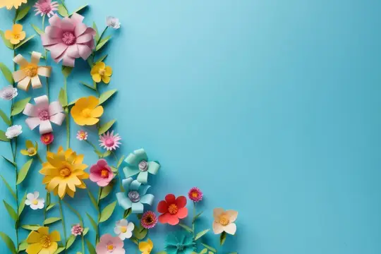 Бумажные цветы на голубом фоне с местом для текста