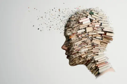 Коллаж из книг в форме женского профиля с рассыпающимися страницами