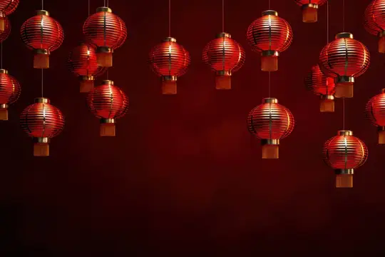 Красные китайские фонарики свисают на тёмно-красном фоне