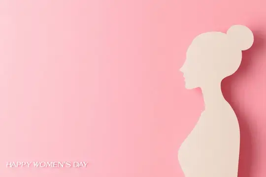Бумажный силуэт женщины на розовом фоне с надписью Happy Women's Day