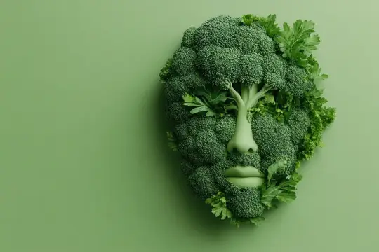 Лицо мужчины выложено из брокколи и зелени на оливковом фоне