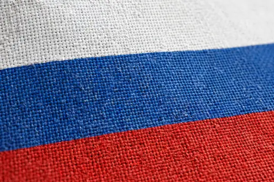 Ткань российского флага крупным планом с фактурой плетения