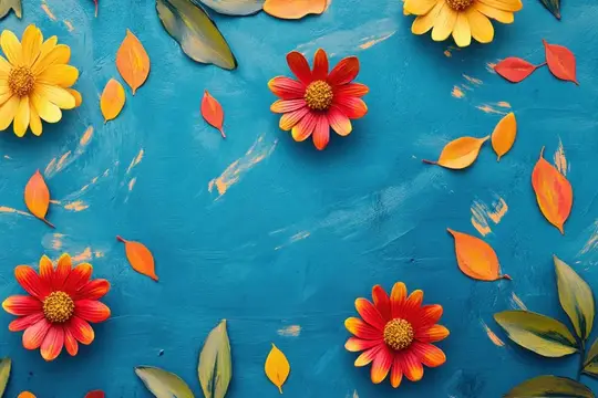 Яркие осенние цветы и листья на синем фоне