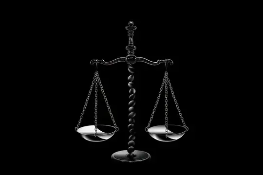 Изображение весов правосудия, символизирующих закон и равенство