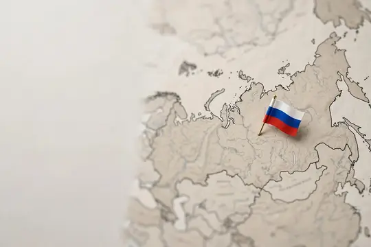 Маленький флажок России на карте Евразии