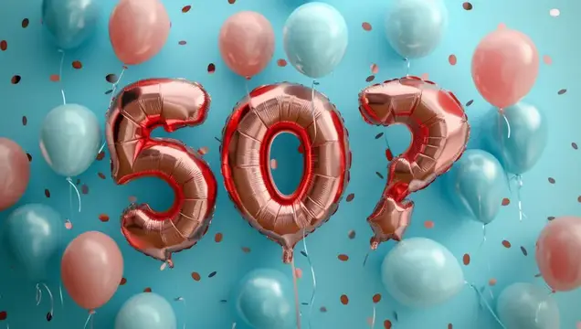 Розовые фольгированные шары с цифрой 507 среди голубых и розовых воздушных шаров