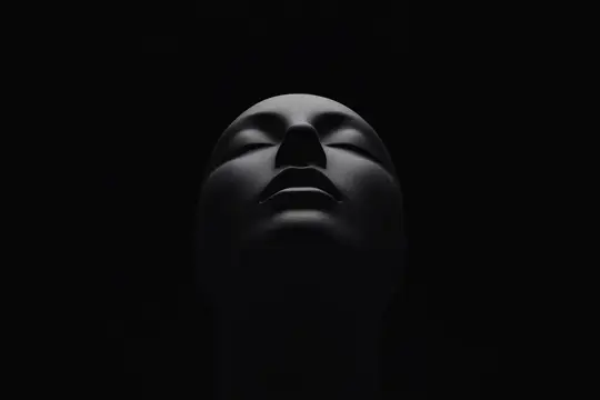 3D-рендер тёмного лица с закрытыми глазами на чёрном фоне