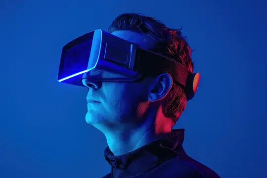 Мужчина в VR-очках в синем неоновом свете