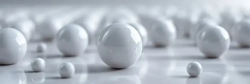 3D-рендер с белыми глянцевыми шарами на светлой поверхности