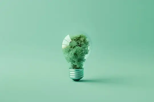 Лампочка с мхом внутри на мятном фоне