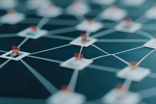 3D-рендер сети из ноутбуков на тёмно-синей поверхности