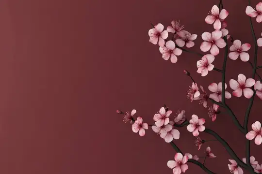 Изысканная ветка цветущей сакуры с нежно-розовыми цветами на насыщенном коричневом фоне