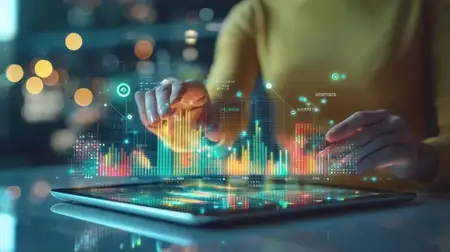 Сосредоточенная профессиональная женщина работает с планшетом, на котором отображаются красочные визуализации данных, что подчеркивает аналитику и технологии в современном рабочем пространстве…