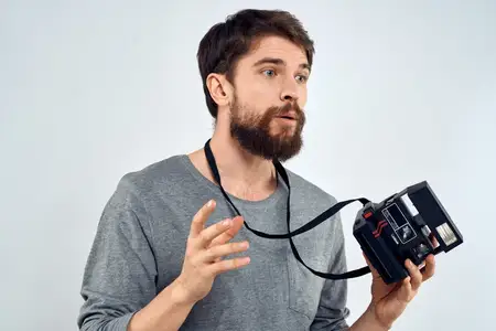 Фотограф с камерой