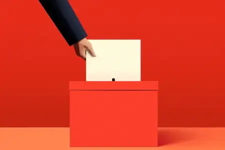 Демократические выборы: рука опускает бюллетень в урну для голосования, символ демократии и политического выбора