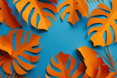 Вырезанные тропические листья на голубом фоне с местом для текста