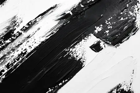 Художественная черно-белая абстрактная текстура с динамичными мазками кисти, идеально подходящая для современного дизайна, фонов или креативных проектов, в которых акцент делается на смелые…