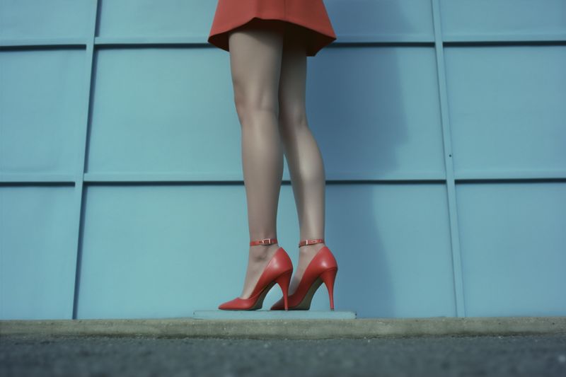 concept woman stylish red blue beautiful colorful fashion shoe foot leg. Generative AI.